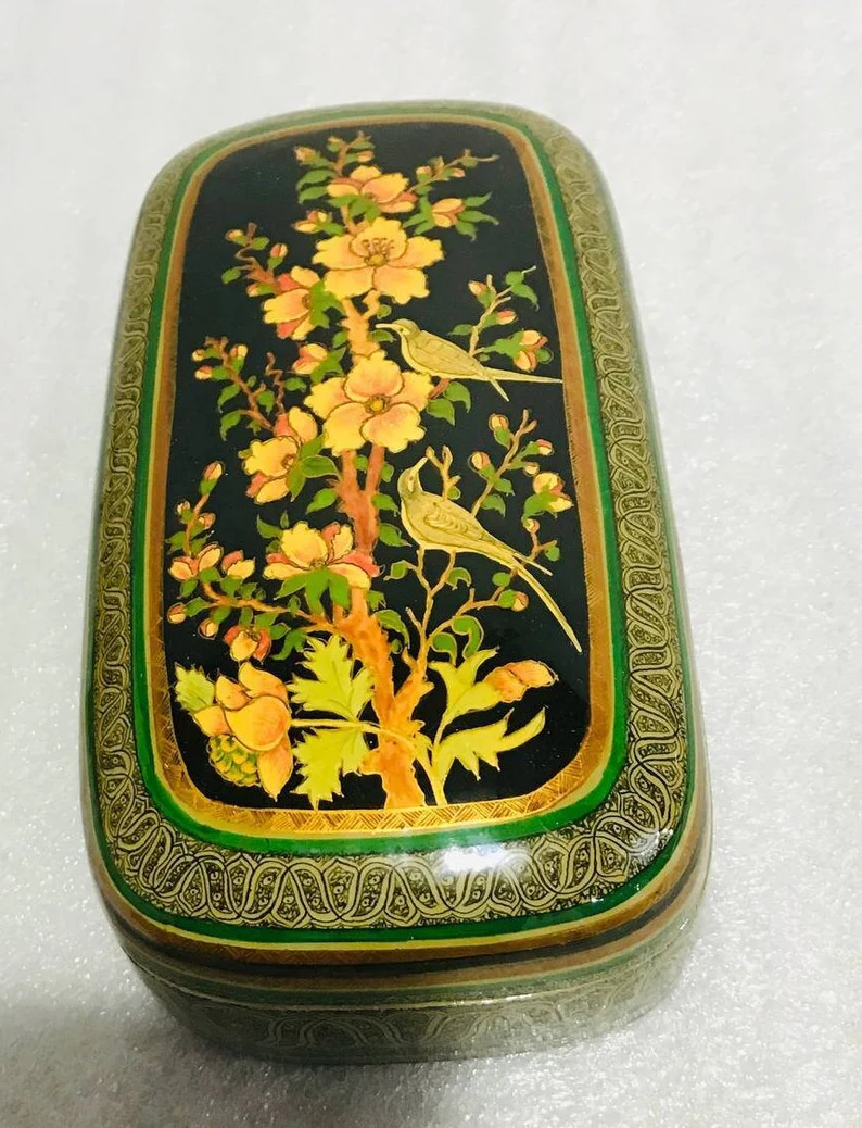 Authentic lacquered paper mache box , hand painted by kashmiri artisians with pure gold work depicting floral designs and bird motifs
